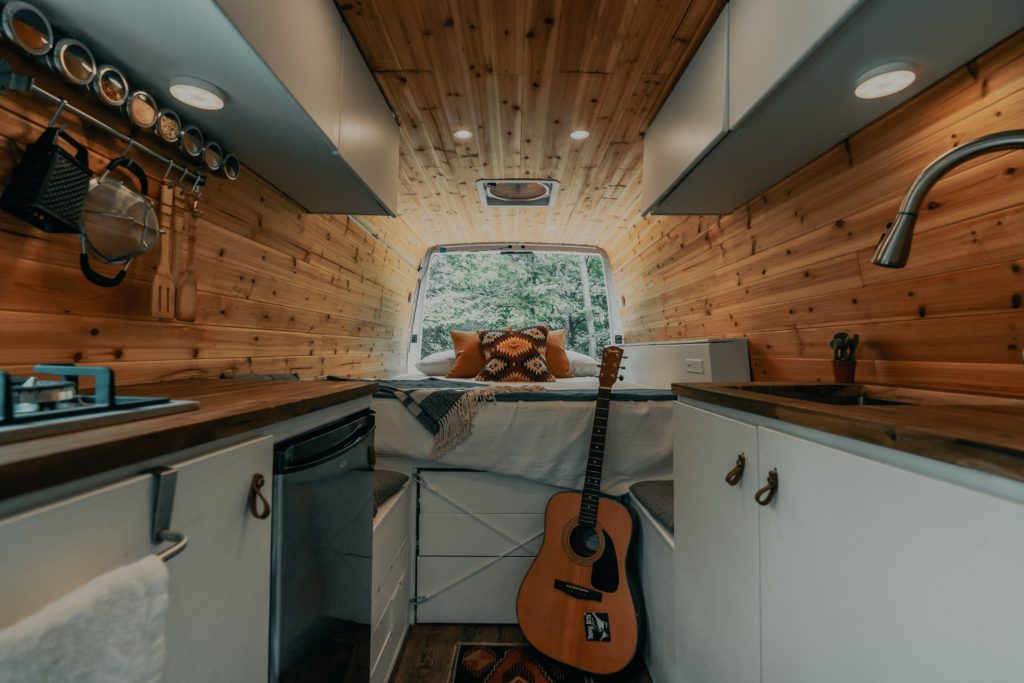 Image shows the inside of a beautiful camper can conversion. 