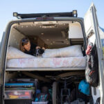 person sleeping in a van